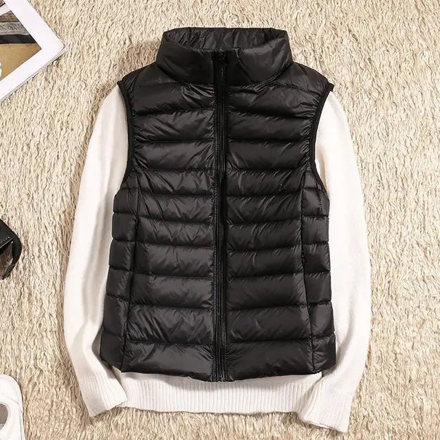 Women's ultra-light puffer vest, warm & packable. Ideal for layering outerwear.