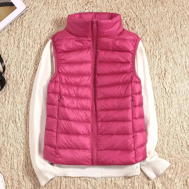 Women's ultra-light, warm puffer vest; packable and perfect for cold-weather layering.