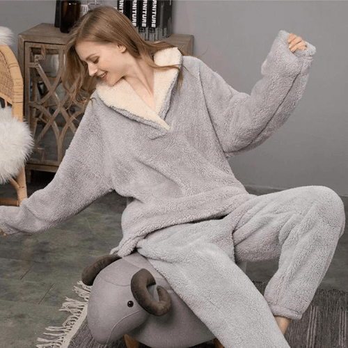 Purple women's fleece pajama set, ultra-soft sleepwear & loungewear, warm & cozy for relaxed evenings.