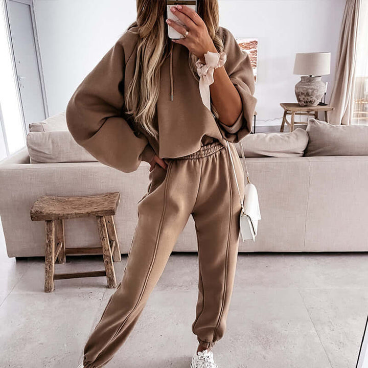 Relaxed fit women's soft knit hoodie and joggers two-piece loungewear set for ultimate comfort.