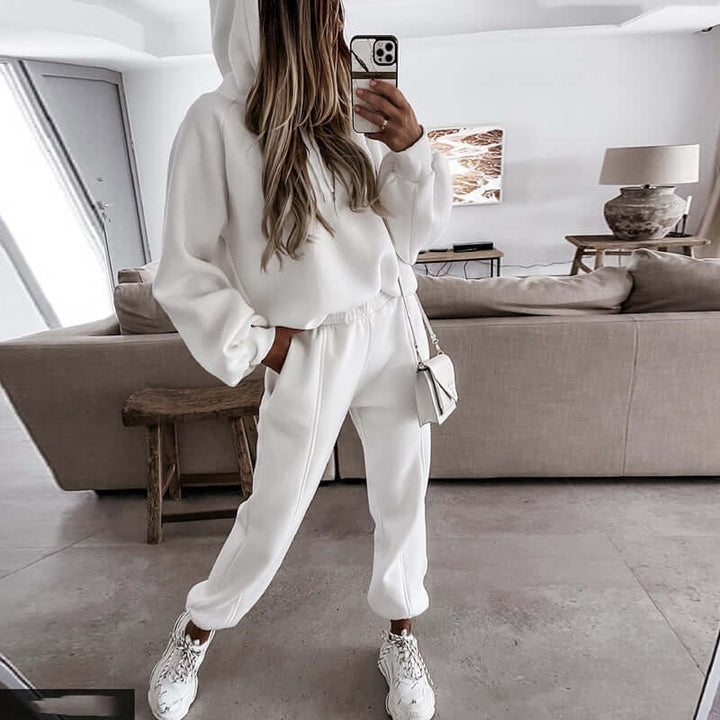 Woman wearing a relaxed fit ultra-soft hoodie and joggers lounge set, showcasing comfortable everyday style.