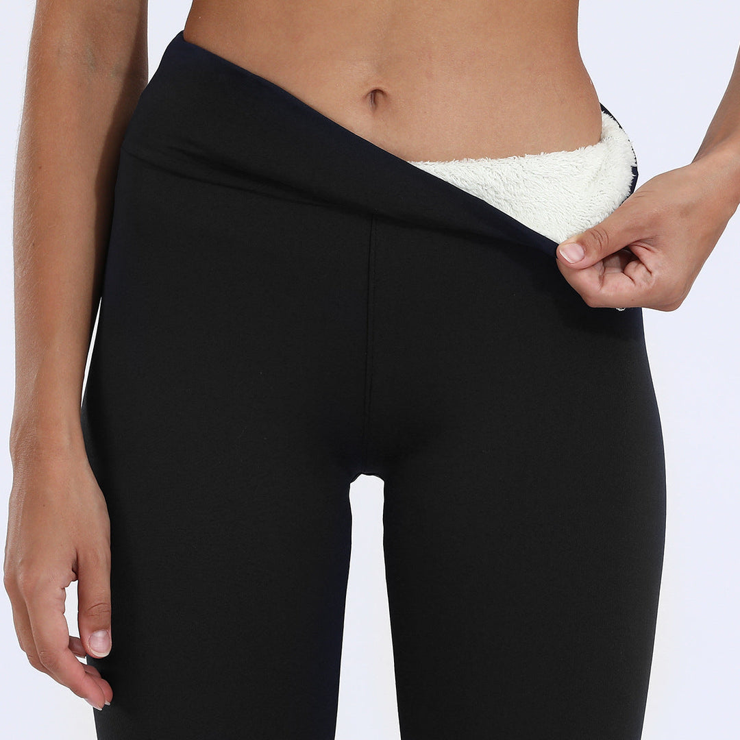 Women's warm thermal pants, high-waisted and lined for cold weather protection.