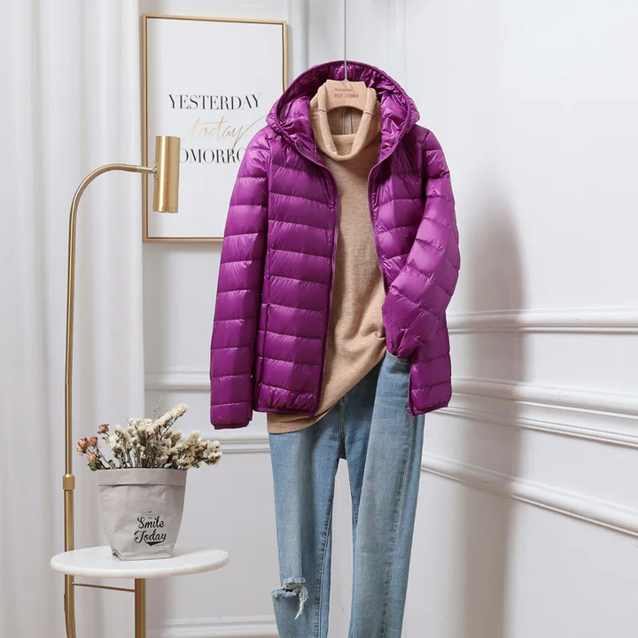 Durable, ultralight nylon women's puffer jacket with hood, water-resistant & warm.