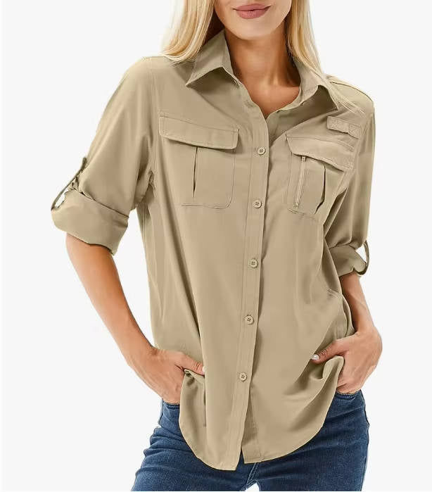 Woman wearing a protective UPF 50 long sleeve hiking shirt, enjoying sun-safe outdoor adventures.