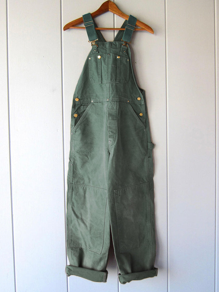 Trendy women's utility dungaree jumpsuit for spring, summer, or fall. Fashionable casual wear romper.
