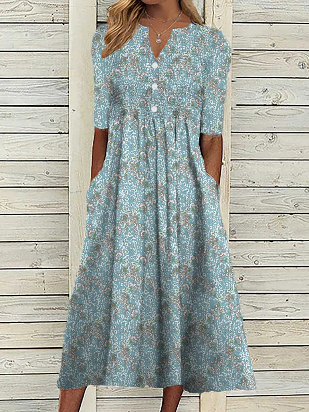 Women's V-neck A-line floral midi dress with half sleeves, perfect for spring/summer, breathable & elegant.