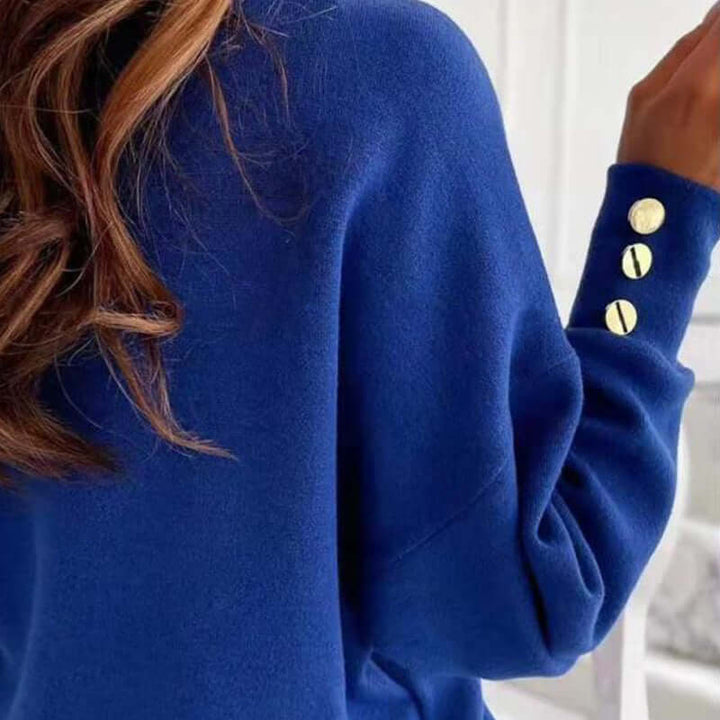 Stylish women's V-neck cotton knit sweater, soft apparel for winter fashion.