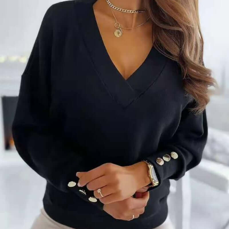 Relaxed fit women's V-neck cotton sweater, long sleeve winter knit, cozy & versatile.