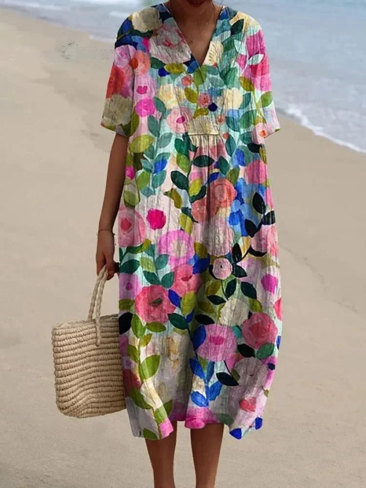 Comfortable women's floral midi dress with V-neck, great for summer, beach, and stylish casual wear. Flowy design.