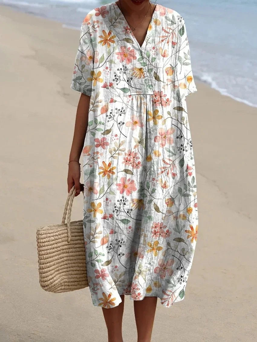 Chic V-neck midi dress for women with beautiful floral patterns, suitable for summer beach outings and vacation.
