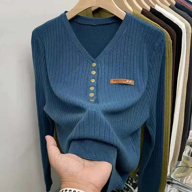 Stylish women's V-neck knitted jumper, a versatile long-sleeve sweater for casual outfits and winter warmth.