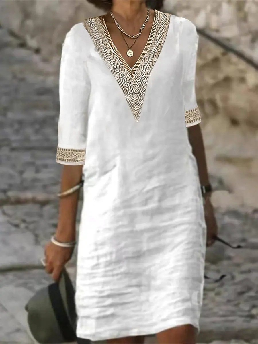 Relaxed fit women's V-neck midi dress with beautiful lace trim and practical 3/4 sleeves. Casual chic.