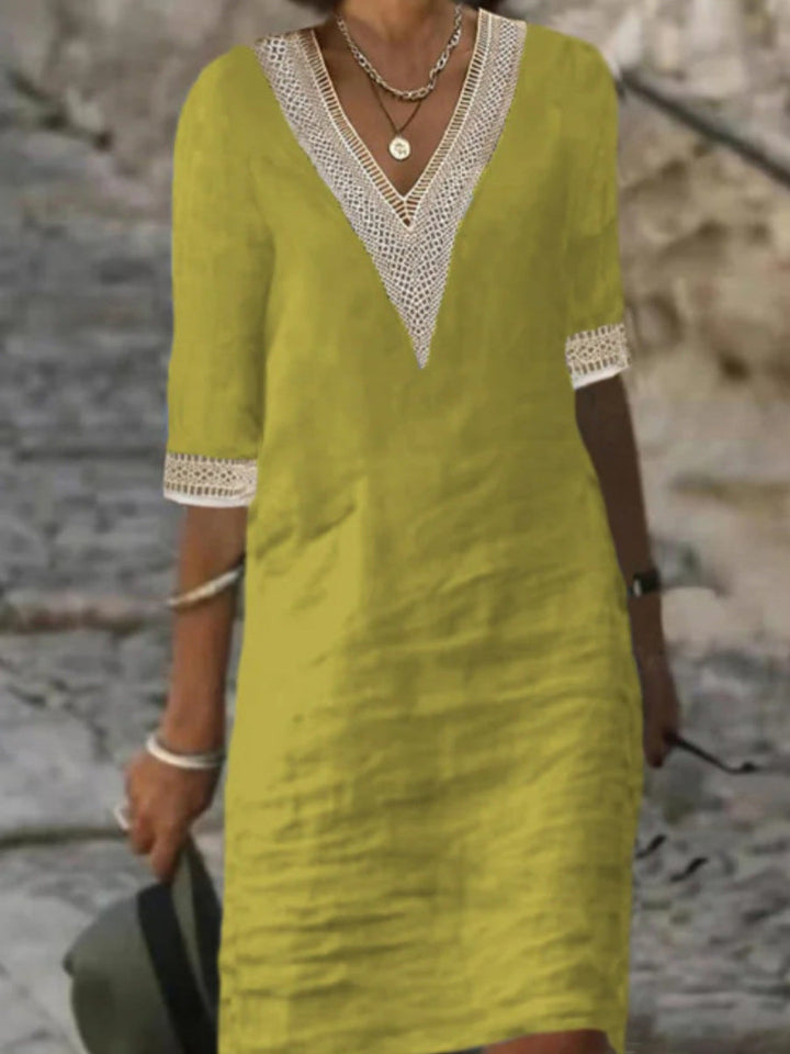 Versatile women's summer midi dress, V-neck, 3/4 sleeves, and lace trim for elegant or casual looks.