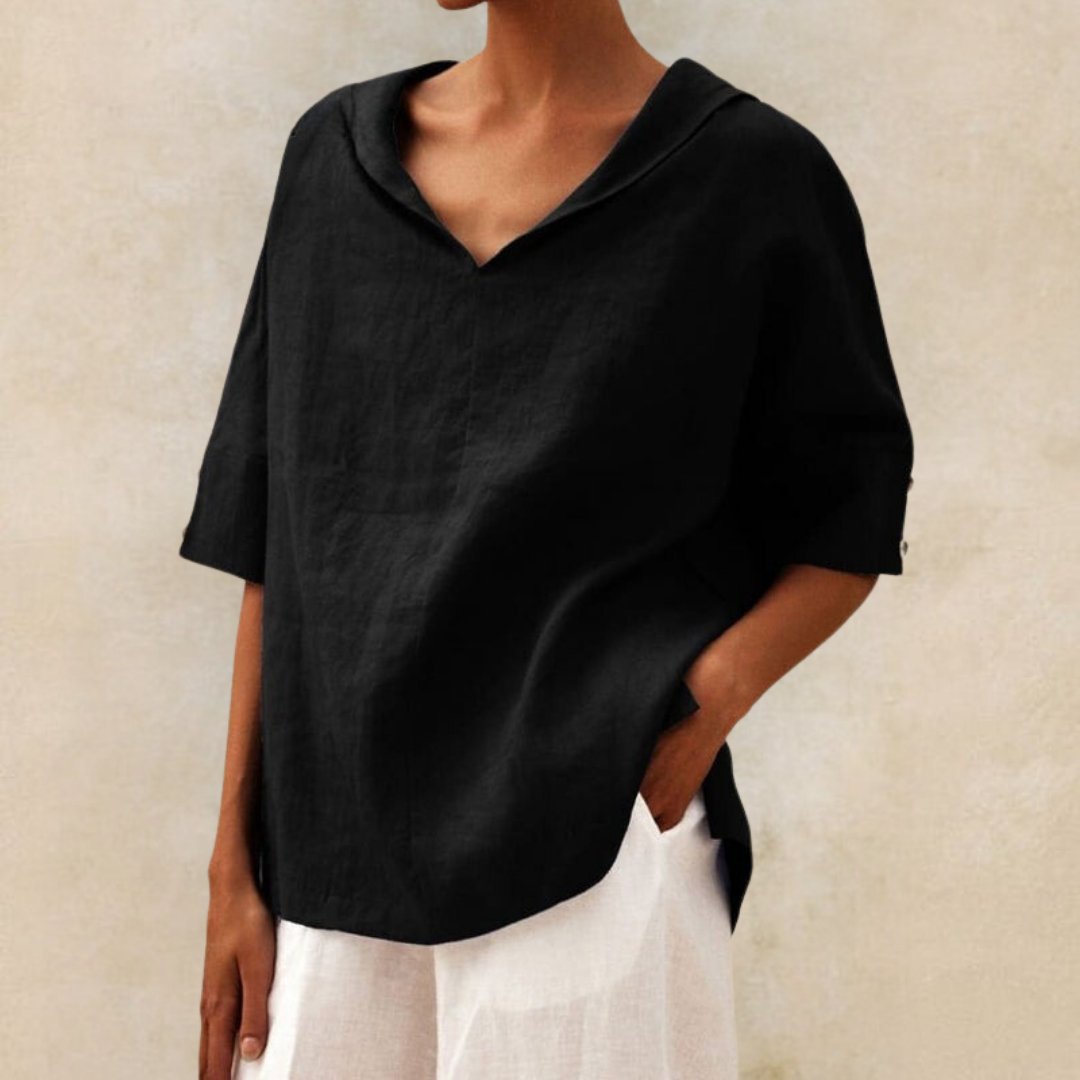 Stylish women's linen blouse, v-neckline, relaxed fit, elbow sleeves, great for breathable summer comfort.