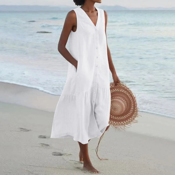 Women's V-neck linen midi dress, flowy summer style. Effortless, elegant, and comfortable for spring/summer.