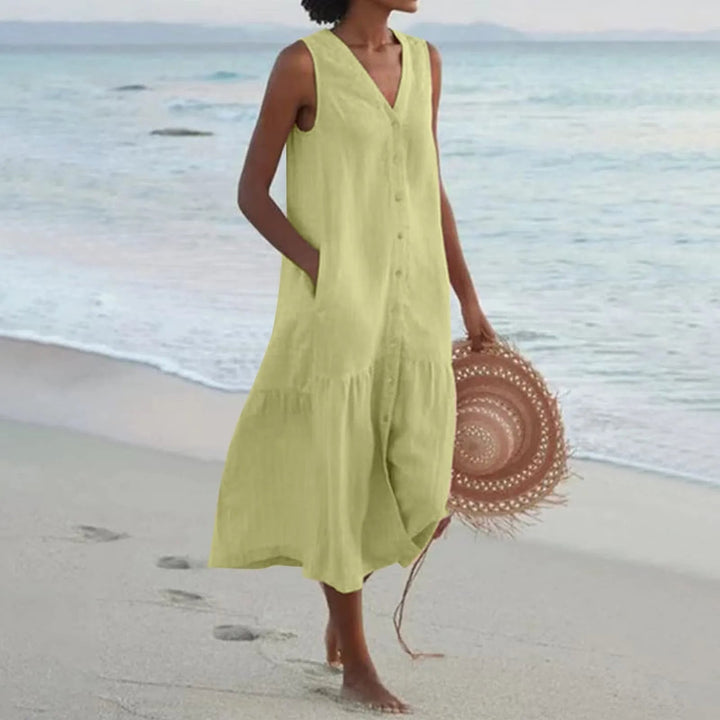 Effortless V-neck linen midi dress for women. Stylish, comfortable summer fashion, perfect for spring.