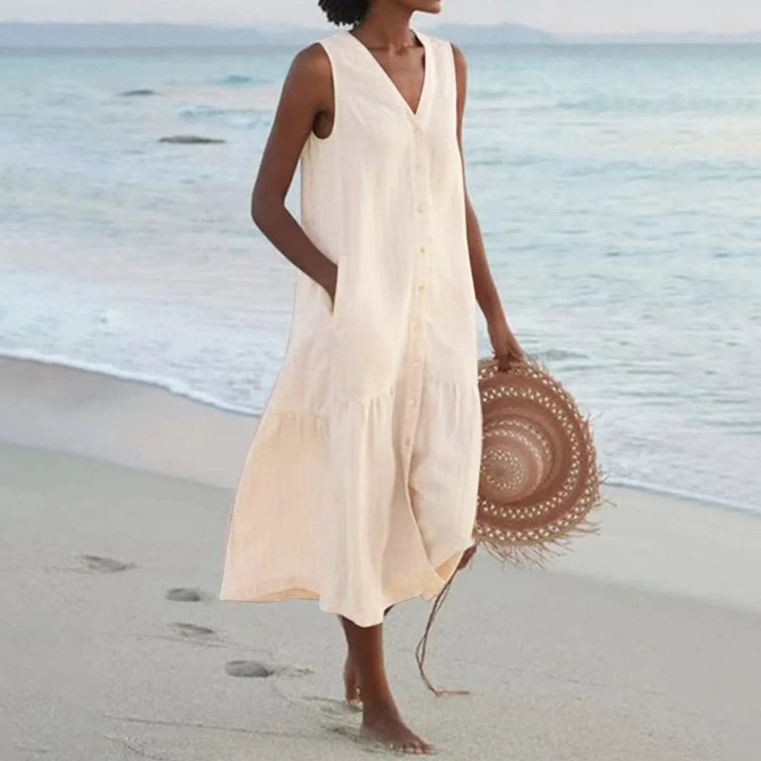 Versatile women's V-neck linen dress. Flowy midi style suitable for casual, party, or elegant summer wear.
