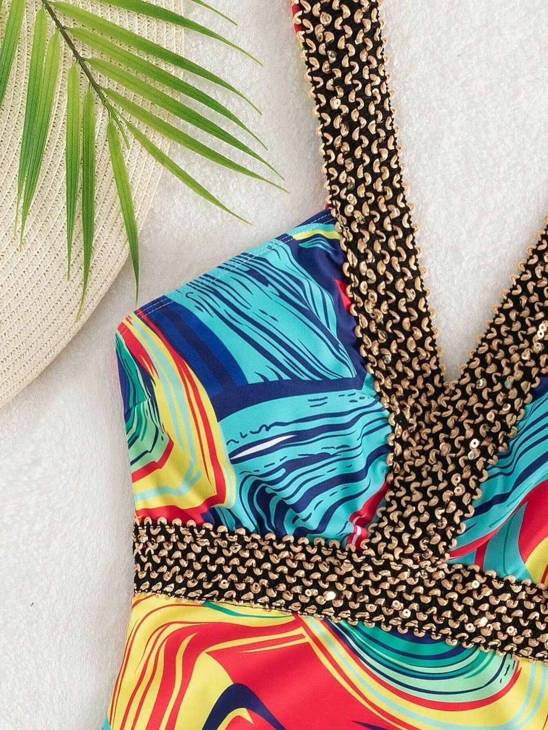 V-neck one-piece swimsuit for women, combining quick-dry fabric with chic summer style, great for vacations.