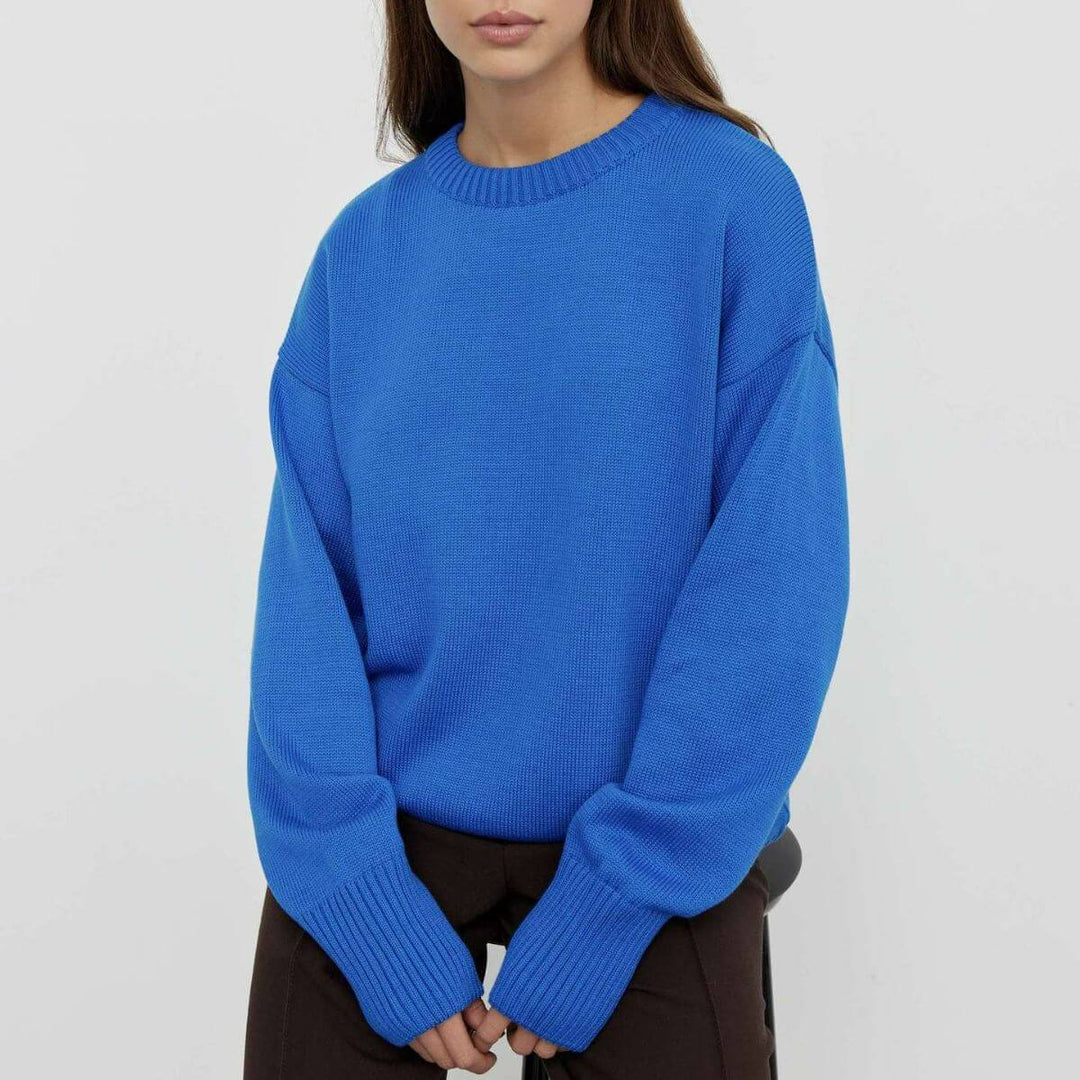 Stylish women's V-neck ribbed knit sweater. Cozy long sleeve knit top, versatile for fall & winter fashion.