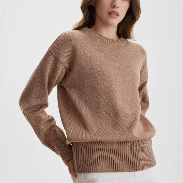 Versatile women's V-neck ribbed knit sweater. Stylish long sleeve knit top, great for casual fall outfits.