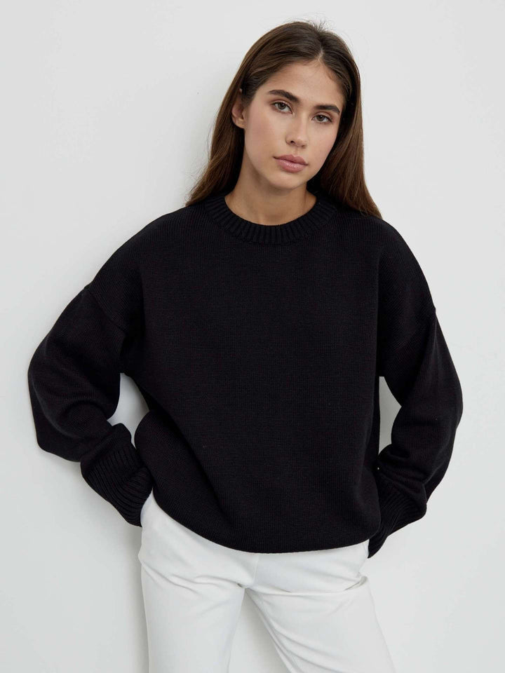 Women's cozy V-neck ribbed knit sweater. Long sleeve knit top, perfect for everyday fall & winter style.