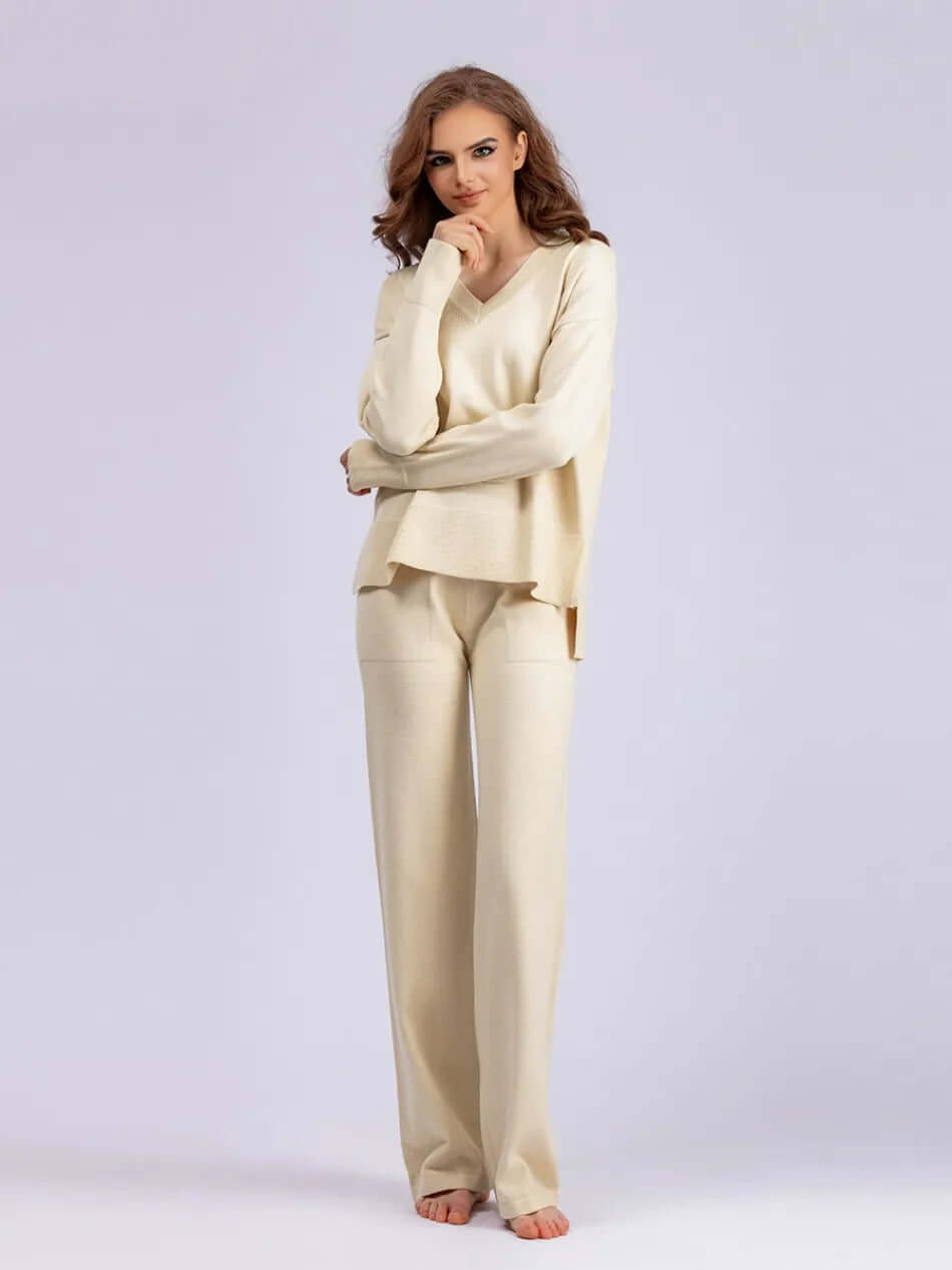 Spring fashion women's set: V-neck sweater & wide-leg trousers. Effortless style, supreme comfort.