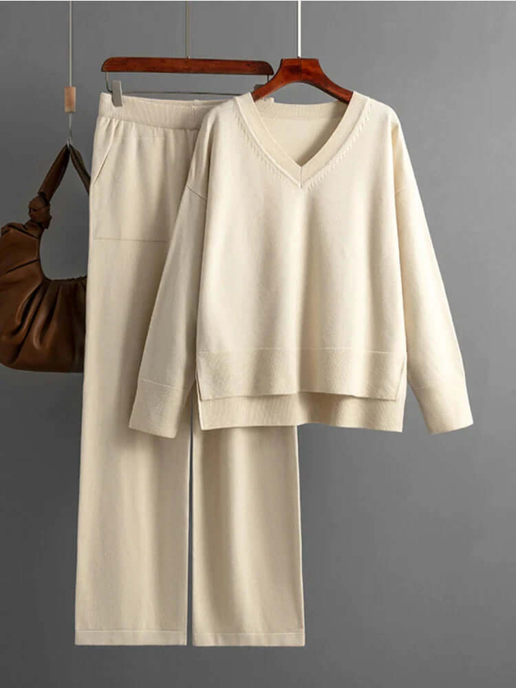 Stylish women's V-neck sweater and wide-leg pants. Perfect for casual spring and fall fashion.
