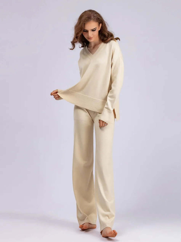Women's comfortable set: V-neck sweater & wide-leg trousers. Perfect for a chic, relaxed aesthetic.