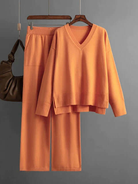 Comfortable women's two-piece set featuring a relaxed fit v-neck sweater & wide-leg pants.