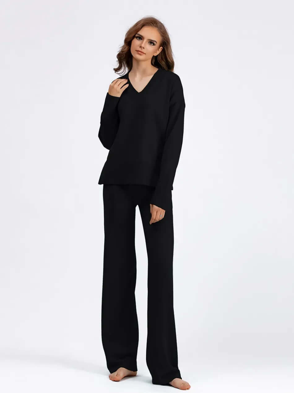Relaxed fit women's v-neck sweater and wide-leg pants set. Stylish & comfortable casual wear.