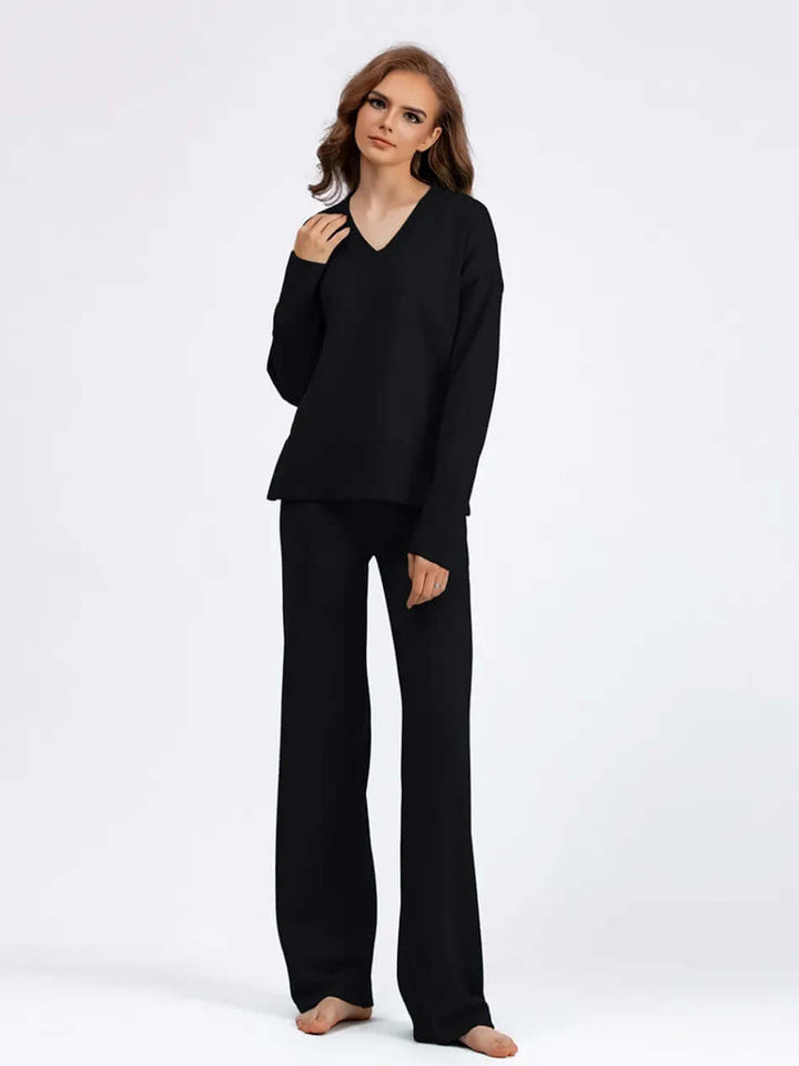 Relaxed fit women's v-neck sweater and wide-leg pants set. Stylish & comfortable casual wear.