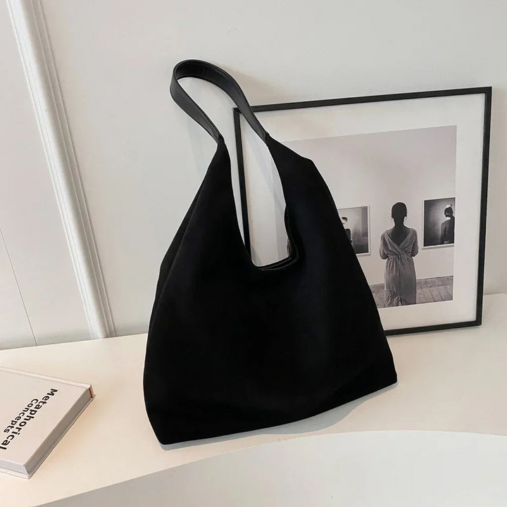 Multipurpose women's shoulder tote, a spacious casual bag perfect for work, travel, and shopping.