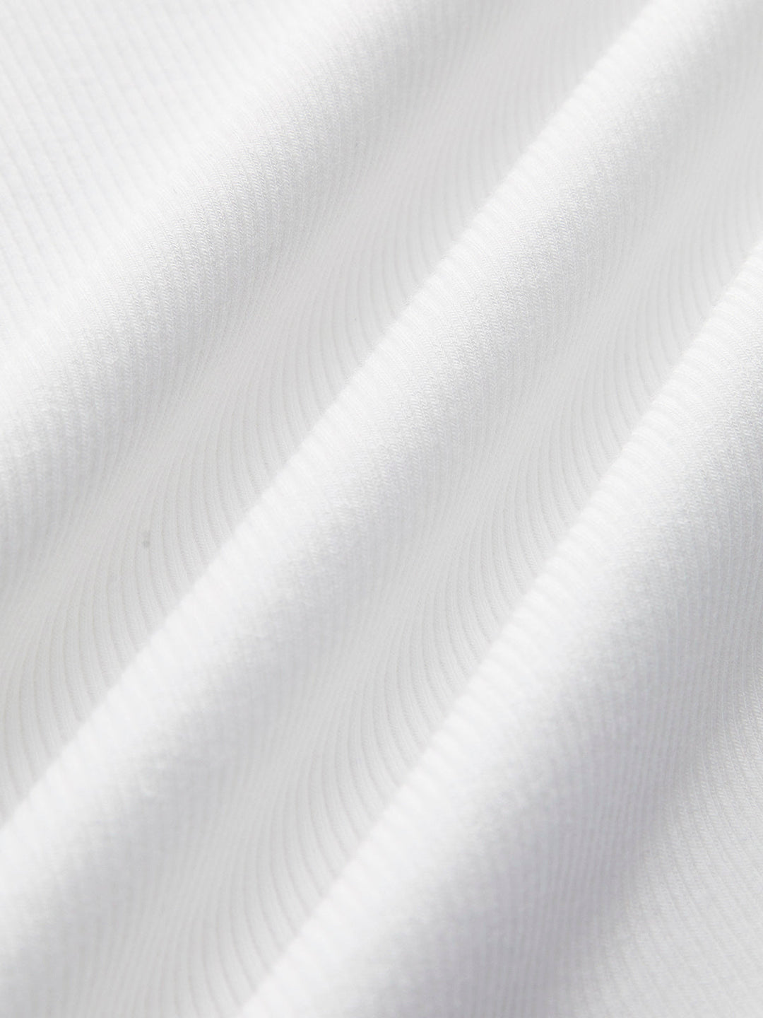 Women's everyday ribbed crop tank top, offering comfortable fitted style & modern texture.