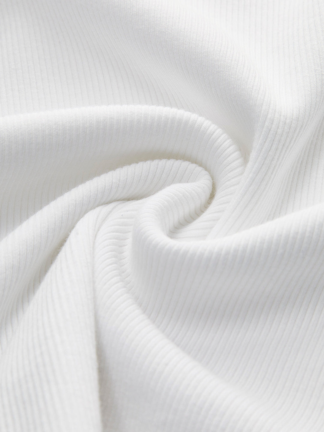 Soft ribbed women's crop tank top, an essential for versatile summer fashion & easy layering.