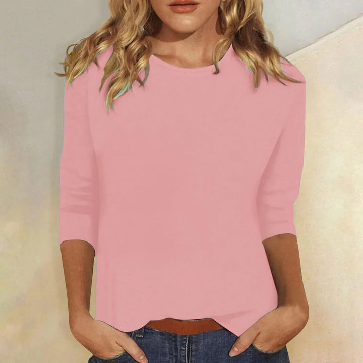 Women's versatile round neck 3/4 sleeve casual top. Comfortable & stylish for everyday wear.