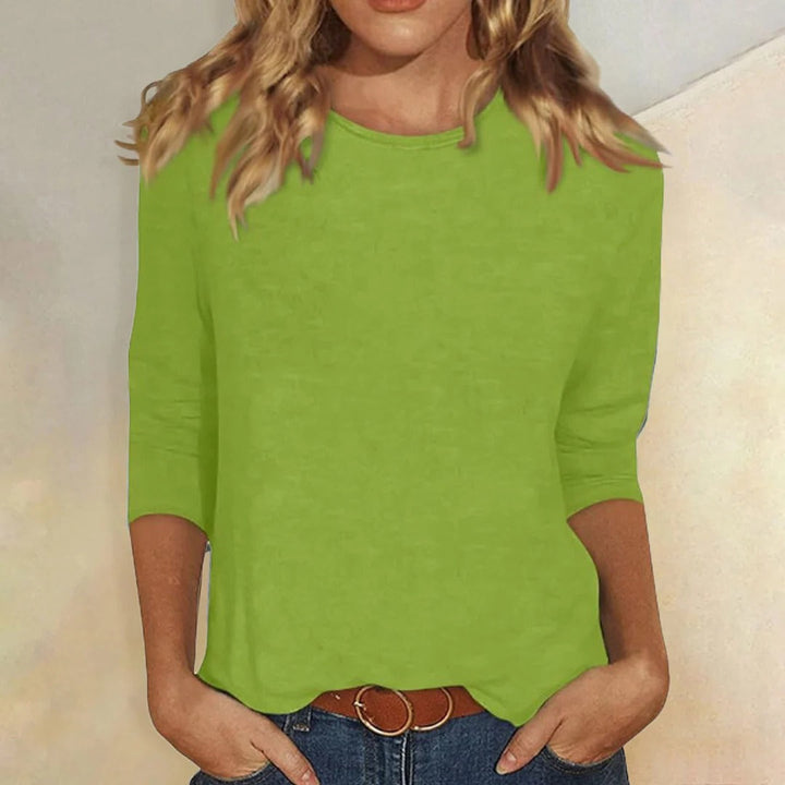 Comfortable women's round neck 3/4 sleeve top, perfect for versatile everyday casual wear.