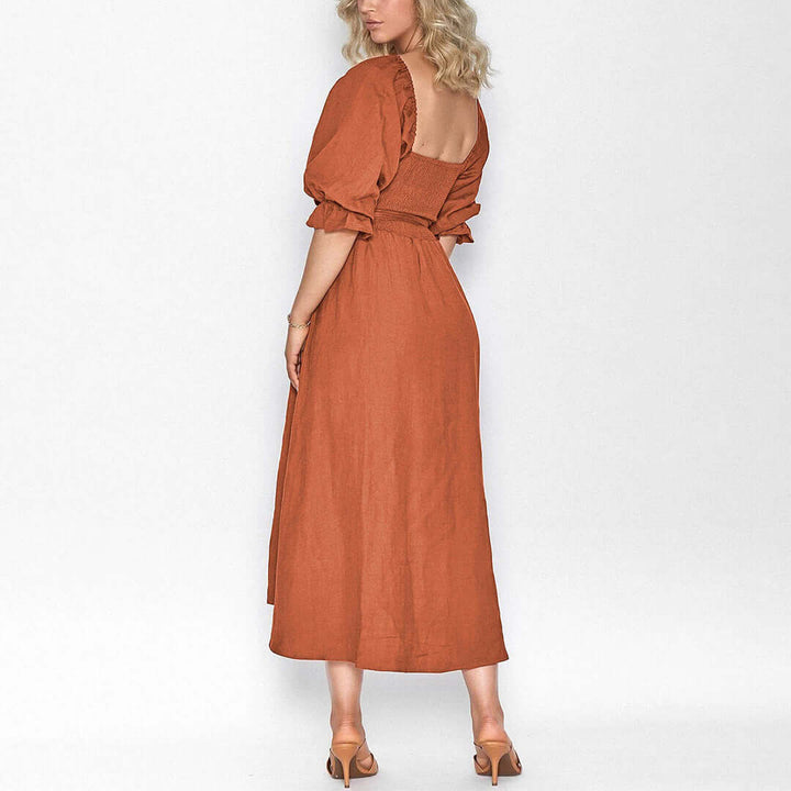 Women's versatile summer dress, flowy fabric, effortless chic style, perfect for casual or elegant occasions.