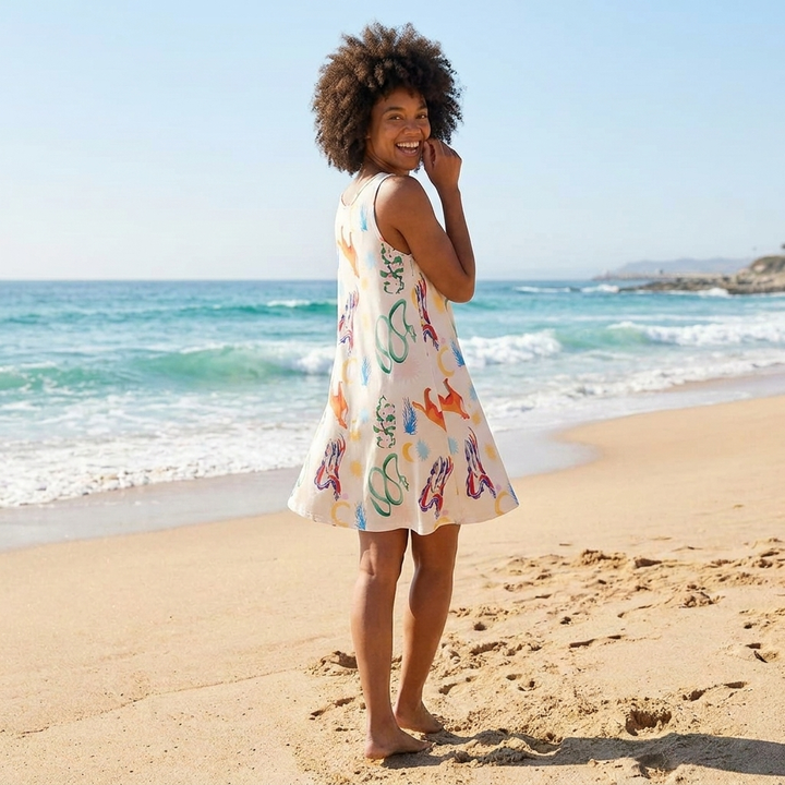 Flowy boho-style women's summer midi dress, colorful printed, square neck. Ideal for beach, resort, or casual wear.