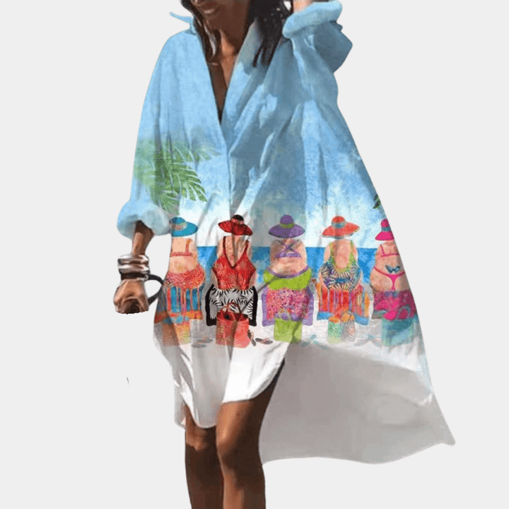 Women's vibrant flowy summer dress, loose fit, comfortable & stylish for casual wear. Perfect for beach.