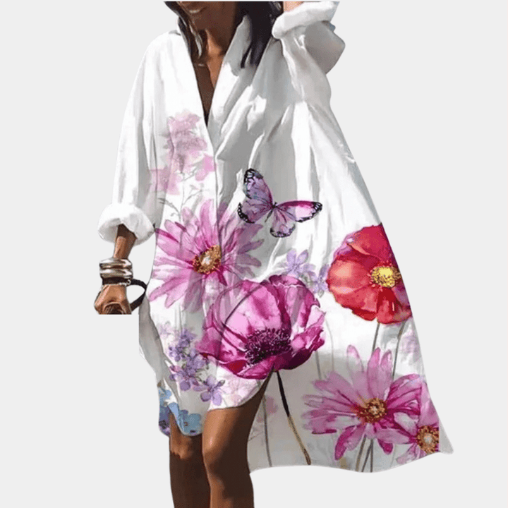 Elegant women's polyester flowy summer dress with a comfortable loose fit. Ideal for casual outings.