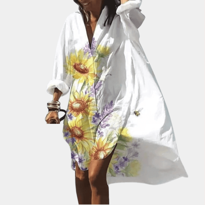 Comfortable women's flowy summer dress, vibrant polyester fabric, loose fit. Elegant casual beachwear.
