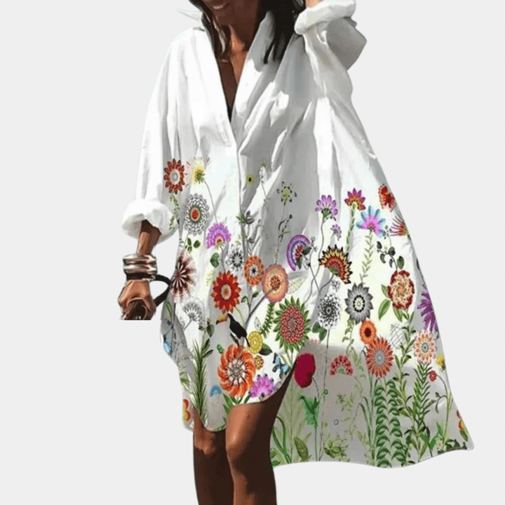 Vibrant women's casual flowy summer dress, loose fit, comfortable & stylish. Great for beach or everyday.
