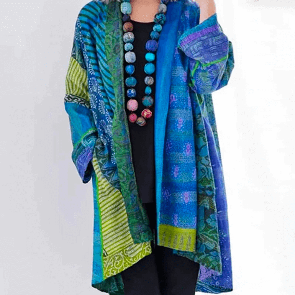 Women's vibrant knit cardigan with modern vintage style, colorful design. Perfect as versatile outerwear.