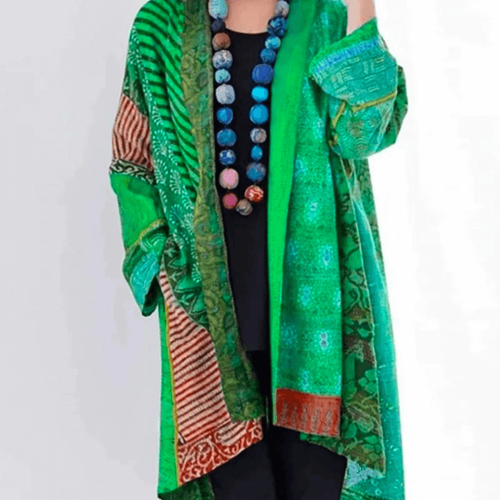 Women's vibrant modern vintage style cardigan, colorful knit sweater. Comfortable and fashionable outerwear.
