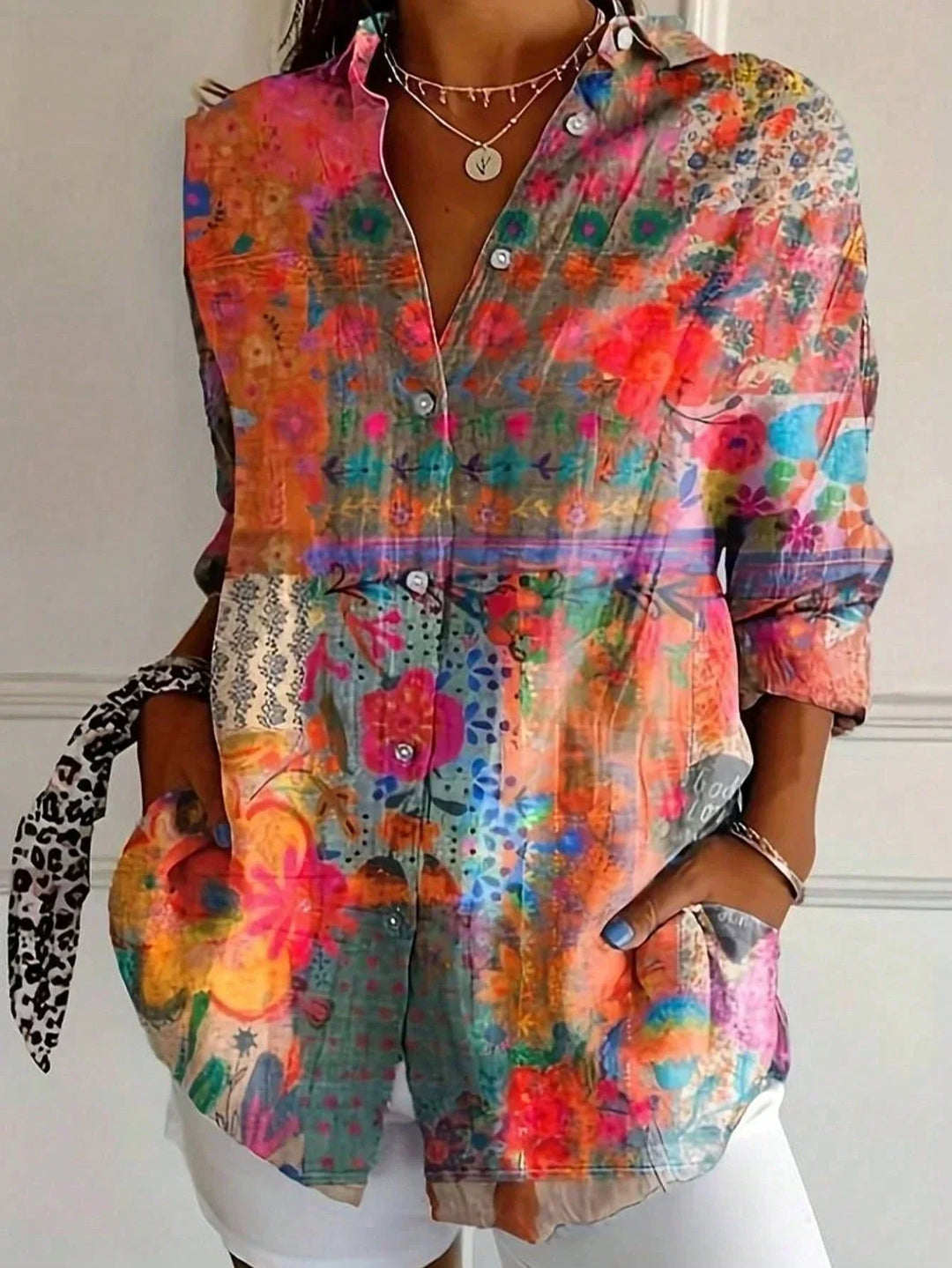 Colorful print women's blouse, a vibrant top for spring fashion and casual elegance.