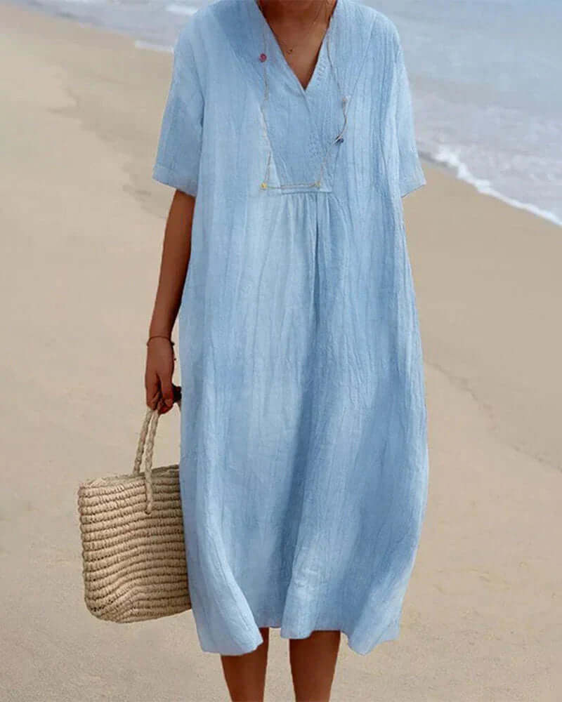 Women's vibrant printed summer midi dress, lightweight & comfortable for casual wear or vacation outfits.