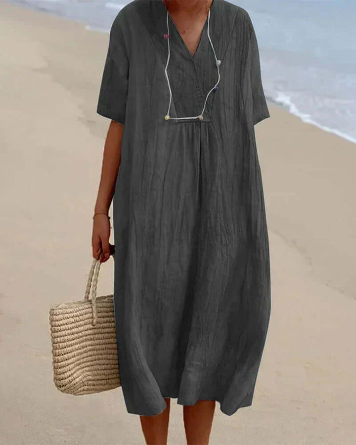Lightweight women's vibrant printed midi dress, ideal comfortable summer dress for vacation outfits.