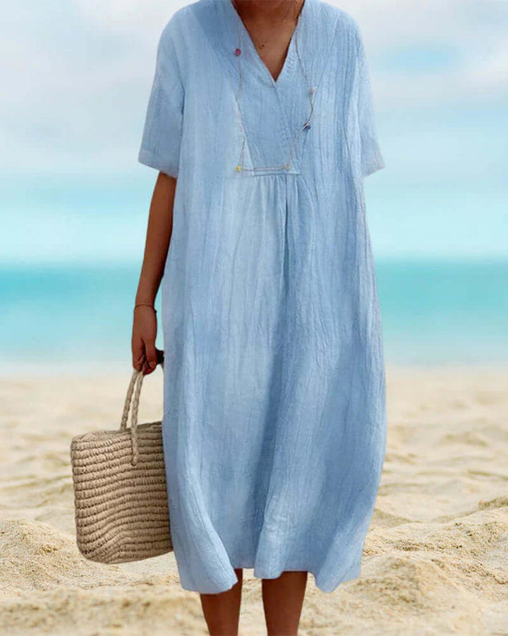 Stylish women's printed summer midi dress with vibrant design, offering comfortable & casual fashion.
