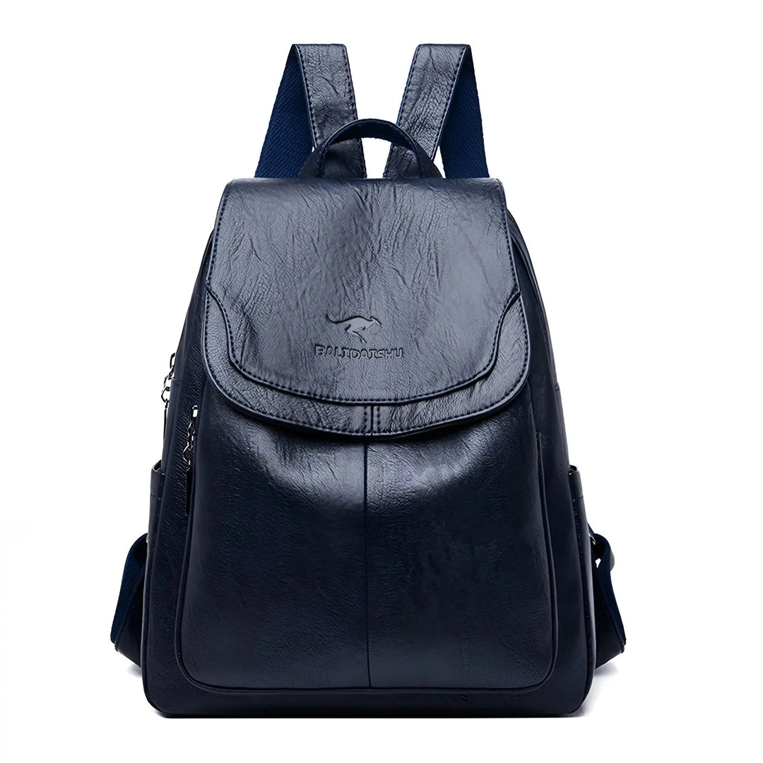 Side view of a women's vintage leather backpack, showcasing its slim profile & comfortable straps.