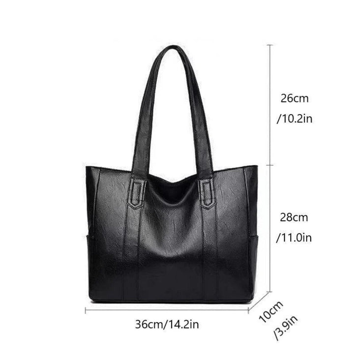 Stylish women's vintage leather shoulder bag, a classic black fashion accessory perfect for everyday elegance.